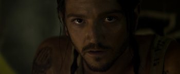 Movie still from “Elysium” (2013), directed by Neill Blomkamp – A person with long hair; Close Up shot, High angle