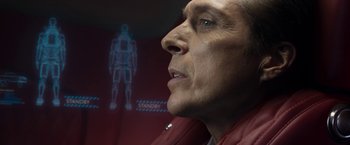 Movie still from “Elysium” (2013), directed by Neill Blomkamp – An older man is looking at a human skeleton; Close Up shot, Low angle