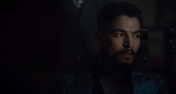 Movie still from “The Tax Collector” (2020), directed by David Ayer – A person with a beard; Close Up shot, Over the shoulder angle