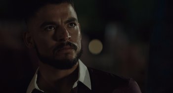 Movie still from “The Tax Collector” (2020), directed by David Ayer – A person with a beard; Close Up shot, Over the shoulder angle