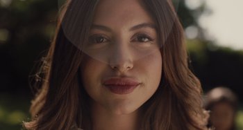 Movie still from “The Tax Collector” (2020), directed by David Ayer – A woman's face with a large eye; Close Up shot, Low angle