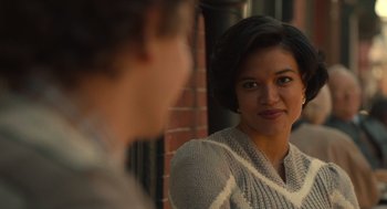 Movie still from “The Tender Bar” (2021), directed by George Clooney – A woman is looking at a man in a mirror; Close Up shot, Over the shoulder angle