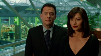 Movie still from “The Terminal” (2004), directed by Steven Spielberg – A man and a woman standing next to each other; Close Up shot, Low angle