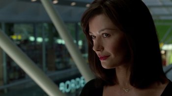 Movie still from “The Terminal” (2004), directed by Steven Spielberg – A person wearing a black shirt; Close Up shot, Over the shoulder angle