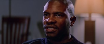 Movie still from “The Thing” (1982), directed by John Carpenter – A person with a beard; Close Up shot, Low angle