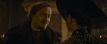 Movie still from “The Three Musketeers - Part I: D'Artagnan” (2023), directed by Martin Bourboulon – A man and a woman talking to each other; Close Up shot, Over the shoulder angle