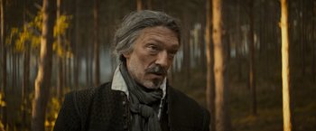 Movie still from “The Three Musketeers - Part I: D'Artagnan” (2023), directed by Martin Bourboulon – A person with a beard; Close Up shot, Low angle