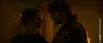 Movie still from “The Three Musketeers - Part I: D'Artagnan” (2023), directed by Martin Bourboulon – A man and a woman standing next to each other; Close Up shot, Low angle