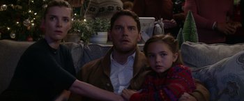 Movie still from “The Tomorrow War” (2021), directed by Chris McKay – A man and a little girl sitting next to each other; Close Up shot, Over the shoulder angle