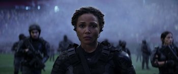 Movie still from “The Tomorrow War” (2021), directed by Chris McKay – A person wearing a uniform; Close Up shot, Low angle