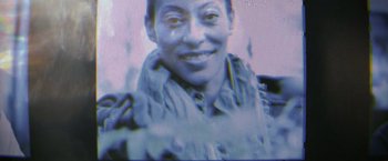 Movie still from “The Tomorrow War” (2021), directed by Chris McKay – A woman's face in a blurry image; Extreme Close Up shot, Low angle