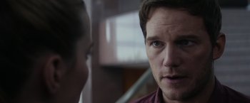 Movie still from “The Tomorrow War” (2021), directed by Chris McKay – A man is looking at another man in a room; Close Up shot, Over the shoulder angle