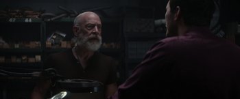 Movie still from “The Tomorrow War” (2021), directed by Chris McKay – An older man with a white beard talking to a younger man; Medium shot, Over the shoulder angle