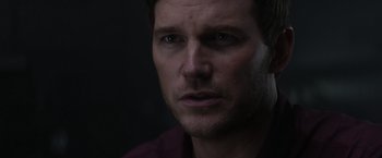 Movie still from “The Tomorrow War” (2021), directed by Chris McKay – A man's face in the dark; Close Up shot, Over the shoulder angle