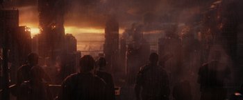 Movie still from “The Tomorrow War” (2021), directed by Chris McKay – Two people are looking out over a city at sunset; Extreme Wide shot, High angle