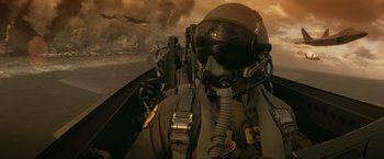 Movie still from “The Tomorrow War” (2021), directed by Chris McKay – A fighter jet pilot in the cockpit of an aircraft; Medium shot, Low angle