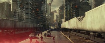 Movie still from “The Tomorrow War” (2021), directed by Chris McKay – People are walking down the street in a city; Extreme Wide shot, High angle