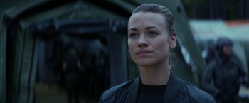 Movie still from “The Tomorrow War” (2021), directed by Chris McKay – A person wearing a black jacket; Close Up shot, Over the shoulder angle