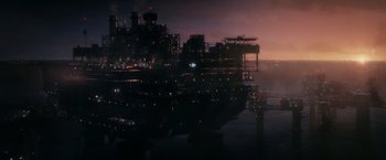 Movie still from “The Tomorrow War” (2021), directed by Chris McKay – An oil rig in the middle of the ocean at night; Extreme Wide shot, High angle