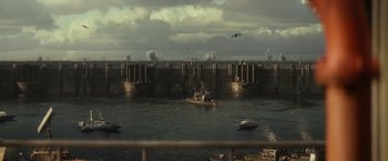 Movie still from “The Tomorrow War” (2021), directed by Chris McKay – An image of a boat in the water near a bridge; Extreme Wide shot, High angle