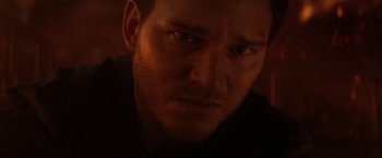 Movie still from “The Tomorrow War” (2021), directed by Chris McKay – A man's face in the dark; Close Up shot, Low angle