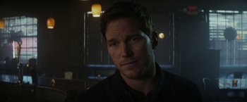 Movie still from “The Tomorrow War” (2021), directed by Chris McKay – A person wearing a black shirt; Close Up shot, Over the shoulder angle