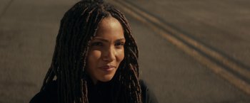 Movie still from “The Tomorrow War” (2021), directed by Chris McKay – A person with dreads; Close Up shot, Over the shoulder angle