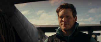 Movie still from “The Tomorrow War” (2021), directed by Chris McKay – A person wearing a jacket; Close Up shot, Over the shoulder angle