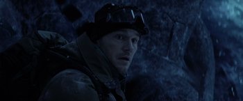 Movie still from “The Tomorrow War” (2021), directed by Chris McKay – A person wearing a helmet; Close Up shot, High angle