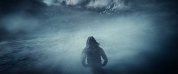 Movie still from “The Tomorrow War” (2021), directed by Chris McKay – A person in a wet suit in the water; Extreme Wide shot, Low angle