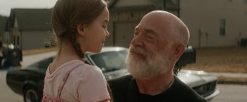 Movie still from “The Tomorrow War” (2021), directed by Chris McKay – An older man and a young girl looking at each other; Close Up shot, Over the shoulder angle