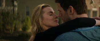 Movie still from “The Tomorrow War” (2021), directed by Chris McKay – A man and a woman are kissing each other; Close Up shot, Over the shoulder angle