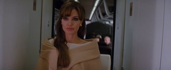 Movie still from “The Tourist” (2010), directed by Florian Henckel von Donnersmarck – A person with long brown hair; Close Up shot, Over the shoulder angle