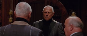 Movie still from “The Tourist” (2010), directed by Florian Henckel von Donnersmarck – An older man looking at himself in the mirror; Close Up shot, Over the shoulder angle