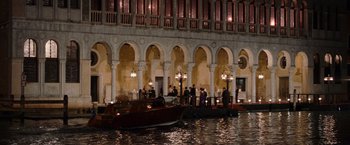 Movie still from “The Tourist” (2010), directed by Florian Henckel von Donnersmarck – A group of people standing next to each other on a boat; Extreme Wide shot, High angle