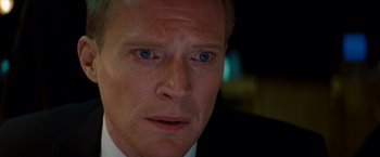 Movie still from “The Tourist” (2010), directed by Florian Henckel von Donnersmarck – A person wearing a suit and tie; Close Up shot, High angle