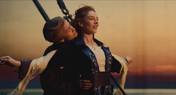 Movie still from “Euphoria” (2019), created by Sam Levinson – A man and a woman are hugging on a boat; Medium shot, Low angle