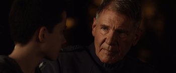 Movie still from “Ender's Game” (2013), directed by Gavin Hood – An older man wearing a uniform looking at a younger man; Close Up shot, Over the shoulder angle