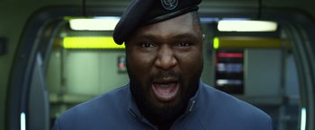 Movie still from “Ender's Game” (2013), directed by Gavin Hood – A person wearing a hat; Close Up shot, Low angle