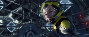 Movie still from “Ender's Game” (2013), directed by Gavin Hood – A person wearing a yellow and black suit and a helmet; Close Up shot, Low angle