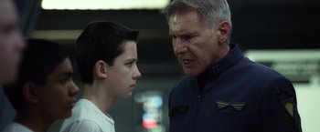 Movie still from “Ender's Game” (2013), directed by Gavin Hood – A man and a young boy talking to each other; Close Up shot, Over the shoulder angle