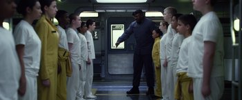 Movie still from “Ender's Game” (2013), directed by Gavin Hood – A group of young men standing in a line; Medium shot, Low angle