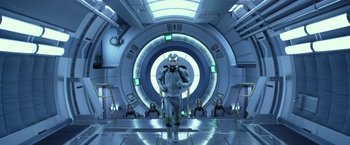 Movie still from “Ender's Game” (2013), directed by Gavin Hood – A group of people sitting on top of a platform; Wide shot, Low angle