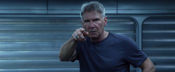 Movie still from “Ender's Game” (2013), directed by Gavin Hood – An older man pointing to the side of a building; Close Up shot, Low angle