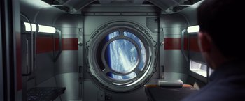 Movie still from “Ender's Game” (2013), directed by Gavin Hood – A view of the earth from inside a space ship; Extreme Wide shot, Overhead angle