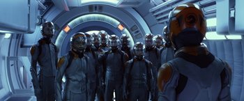 Movie still from “Ender's Game” (2013), directed by Gavin Hood – A group of people in space suits standing in a tunnel; Wide shot, High angle