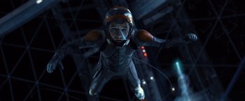 Movie still from “Ender's Game” (2013), directed by Gavin Hood – A man in a spacesuit flying through the air; Medium shot, Overhead angle