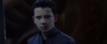 Movie still from “Ender's Game” (2013), directed by Gavin Hood – A young man in a black jacket looking at the camera; Close Up shot, High angle