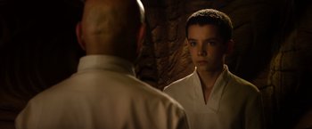 Movie still from “Ender's Game” (2013), directed by Gavin Hood – A young man looking at himself in the mirror; Close Up shot, Over the shoulder angle