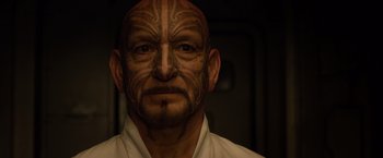 Movie still from “Ender's Game” (2013), directed by Gavin Hood – A person with a tattoo on his face; Close Up shot, Over the shoulder angle
